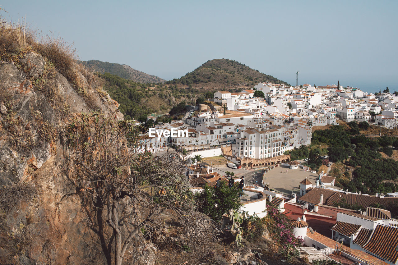 High angle shot of townscape against clear sky