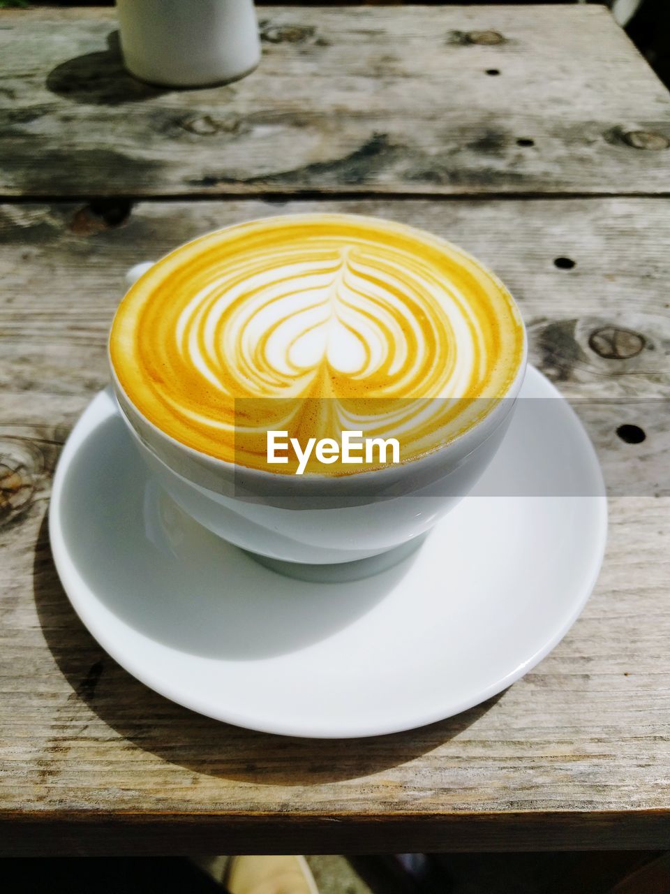 CLOSE-UP OF COFFEE ON TABLE