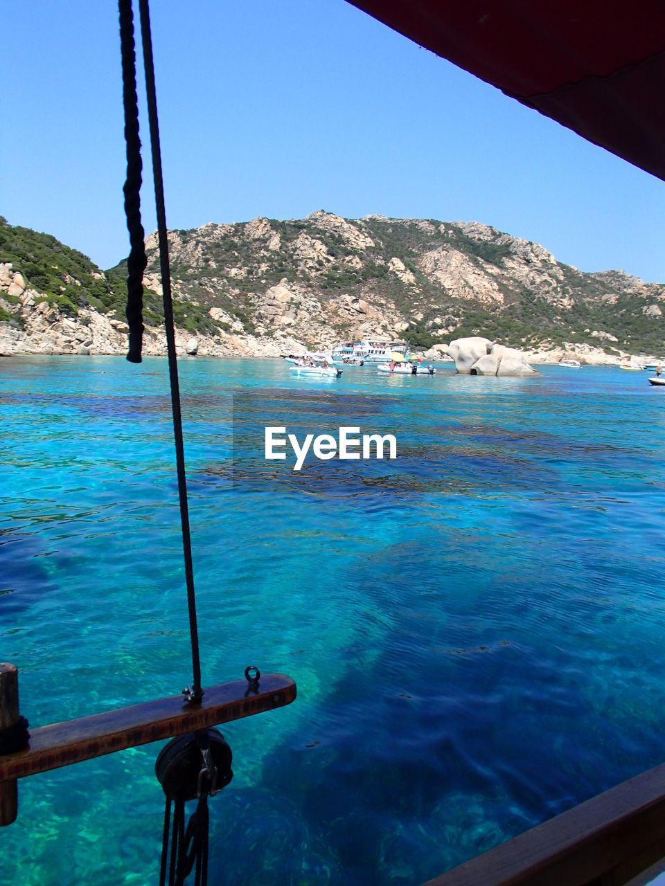 Scenic view of sea with mountains in background