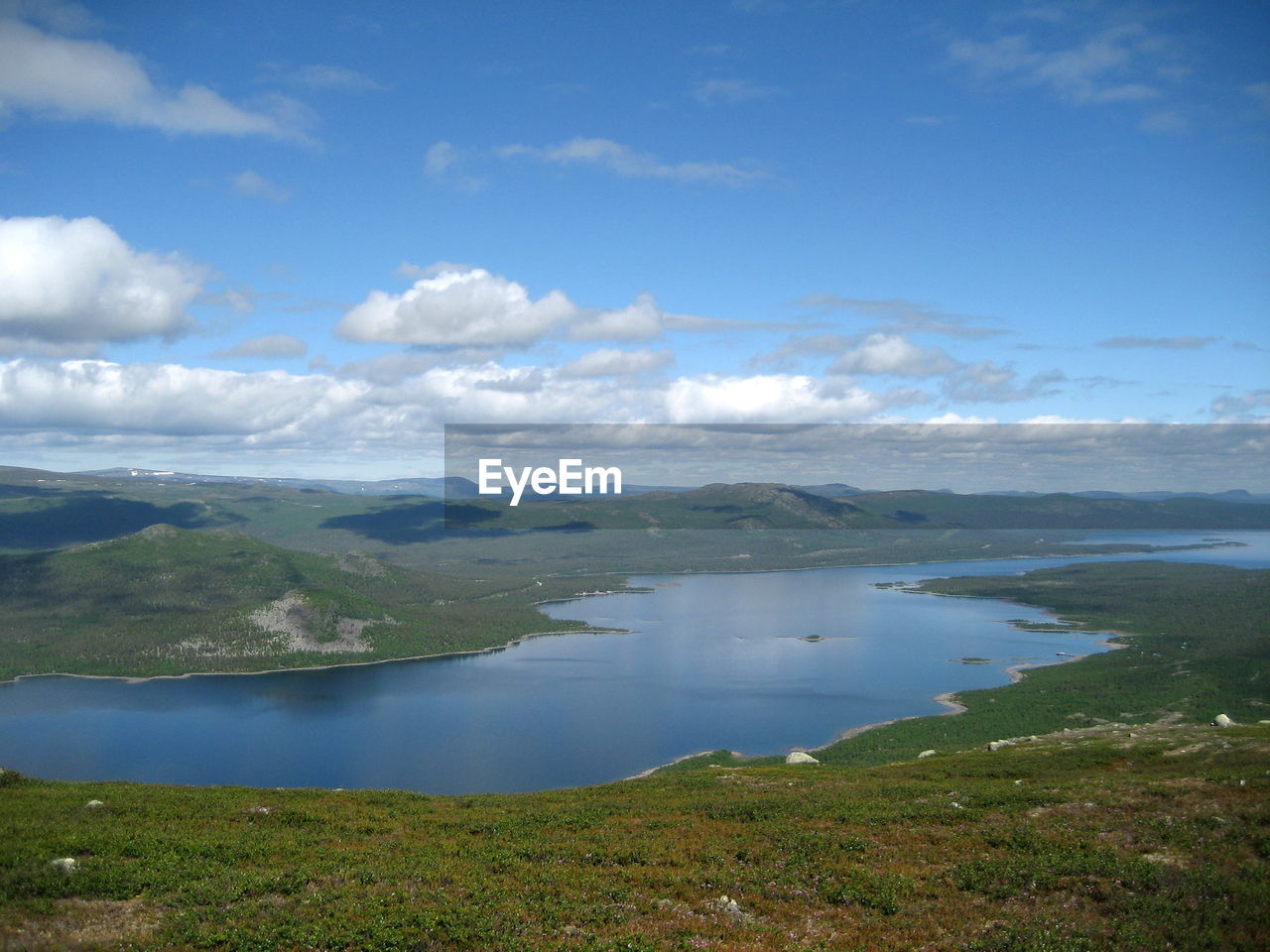 Scenic view of lake against sky