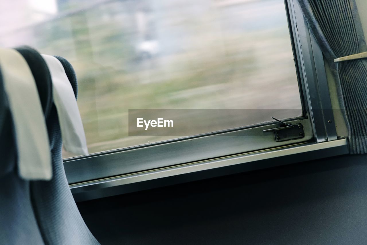 Low angle view of train window