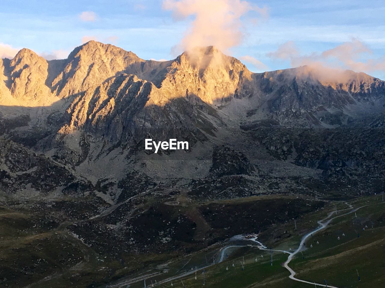 Panoramic view of volcanic mountain range against sky