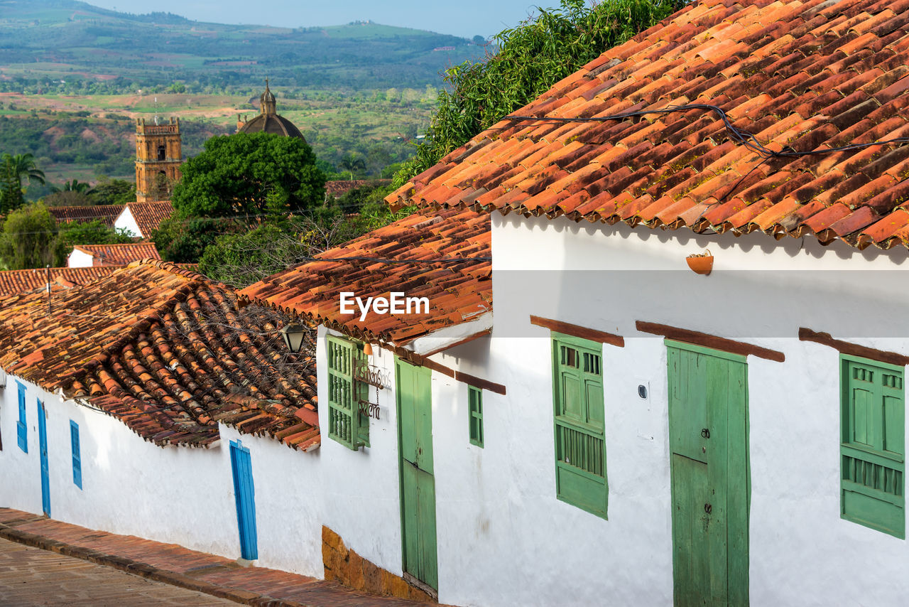 High angle view of houses against trees