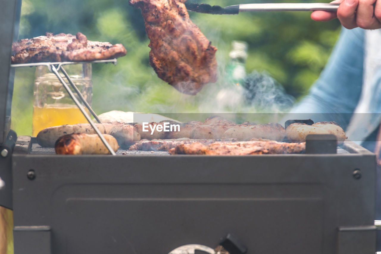 Close-up of meat on barbecue grill