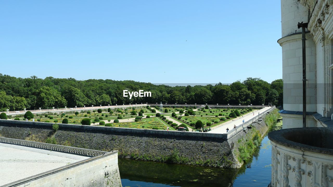 PANORAMIC SHOT OF RIVER AGAINST CLEAR BLUE SKY