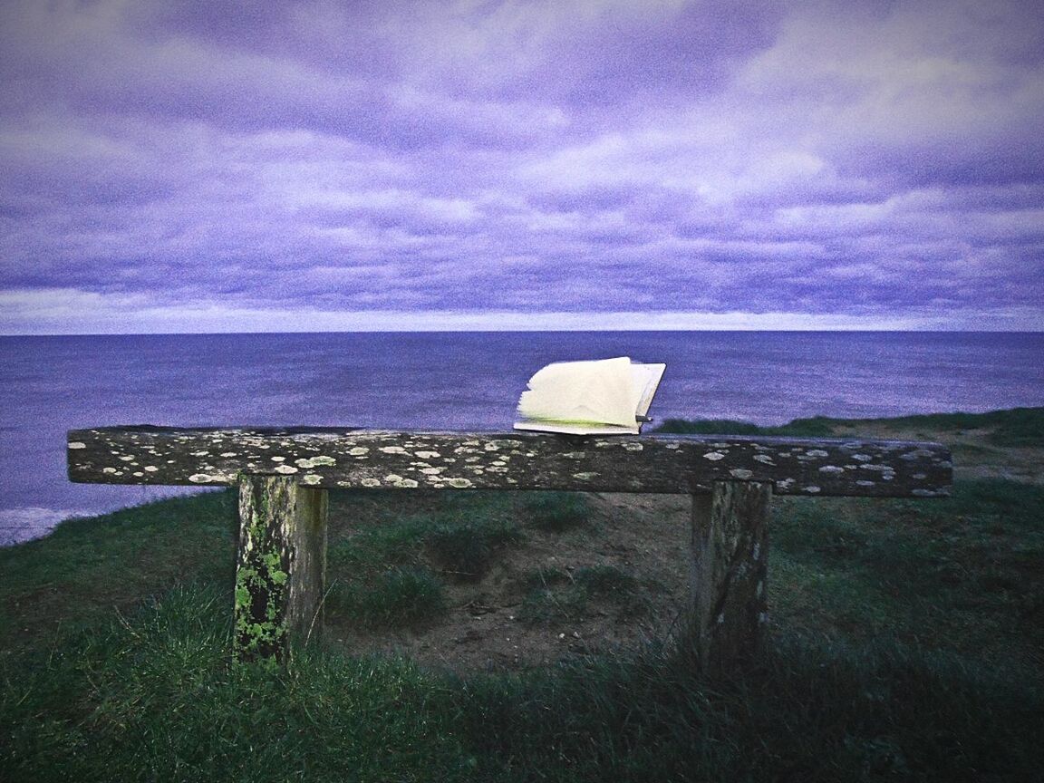 VIEW OF SEA AGAINST CLOUDY SKY