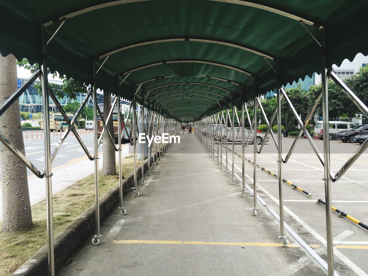 Covered walkway amidst road
