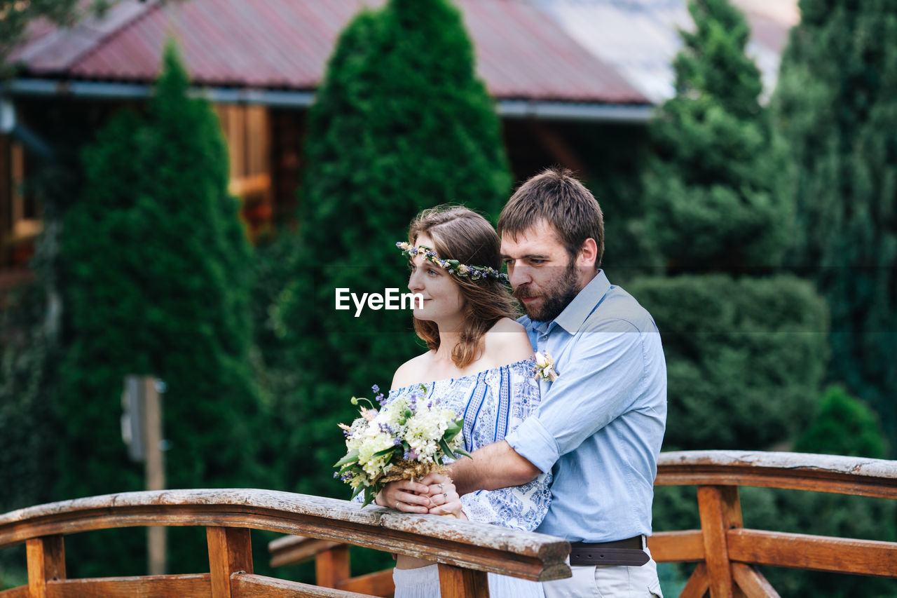 Couple embracing outdoors