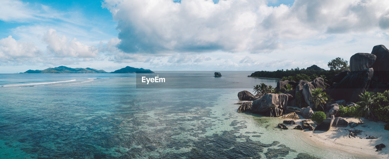 Panoramic view of sea against cloudy sky