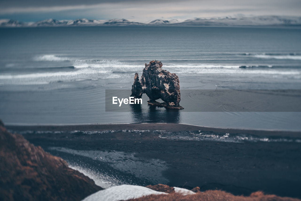 High angle view of driftwood at beach