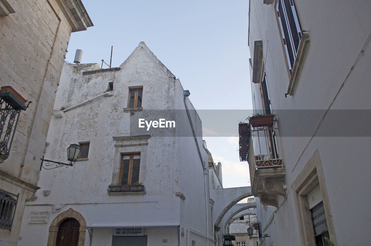 Low angle view of buildings against sky