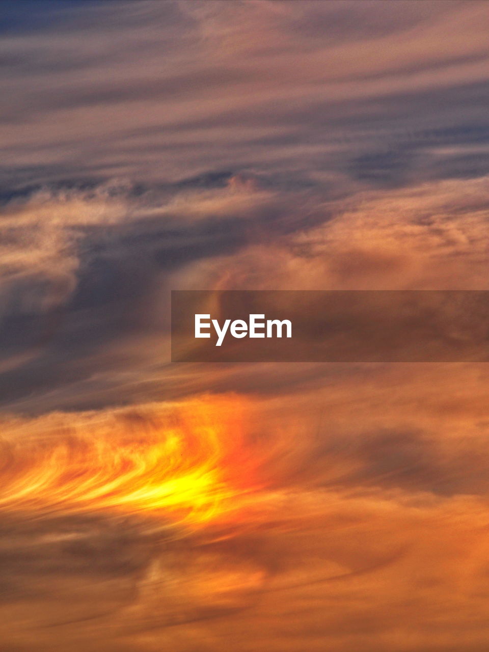 LOW ANGLE VIEW OF ORANGE CLOUDS IN SKY