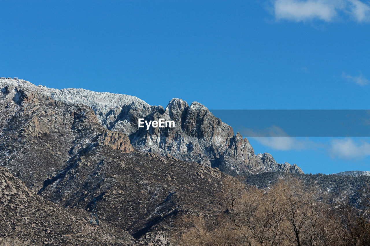 Scenic view of snowcapped mountain against sky. sandia mountains, albuquerque, new mexico