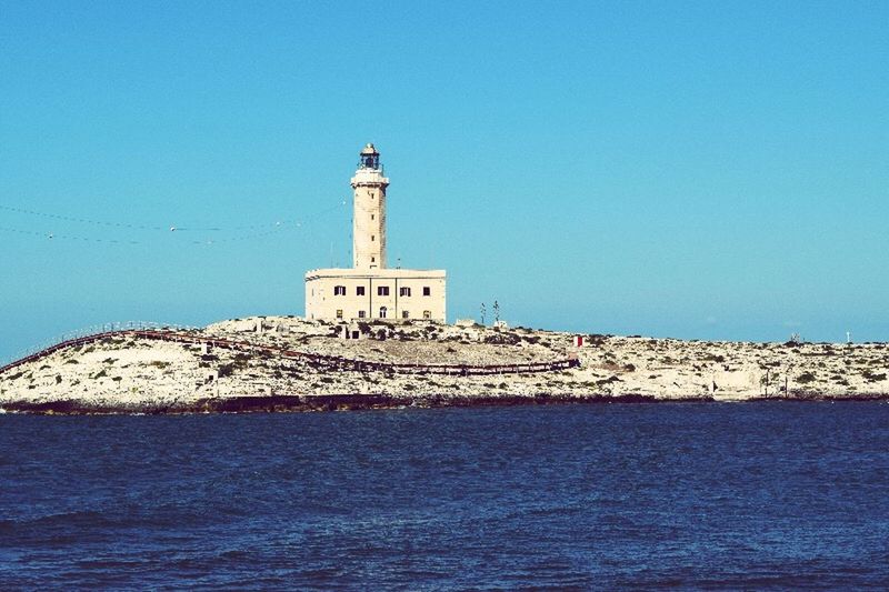 LIGHTHOUSE WITH LIGHTHOUSE IN BACKGROUND