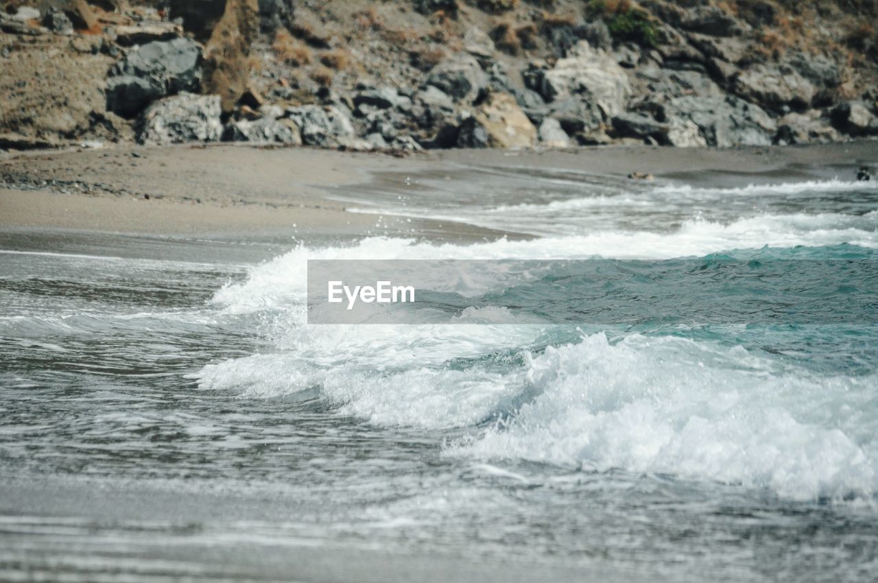 Sea waves reaching towards shore