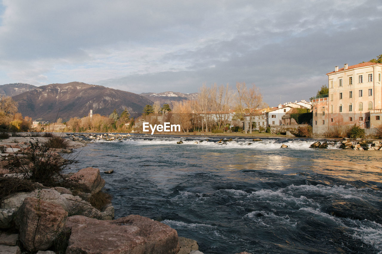 View of river with buildings in background