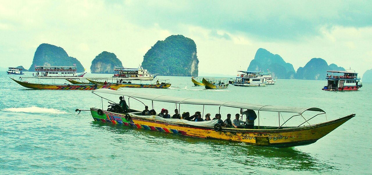 VIEW OF BOATS IN SEA