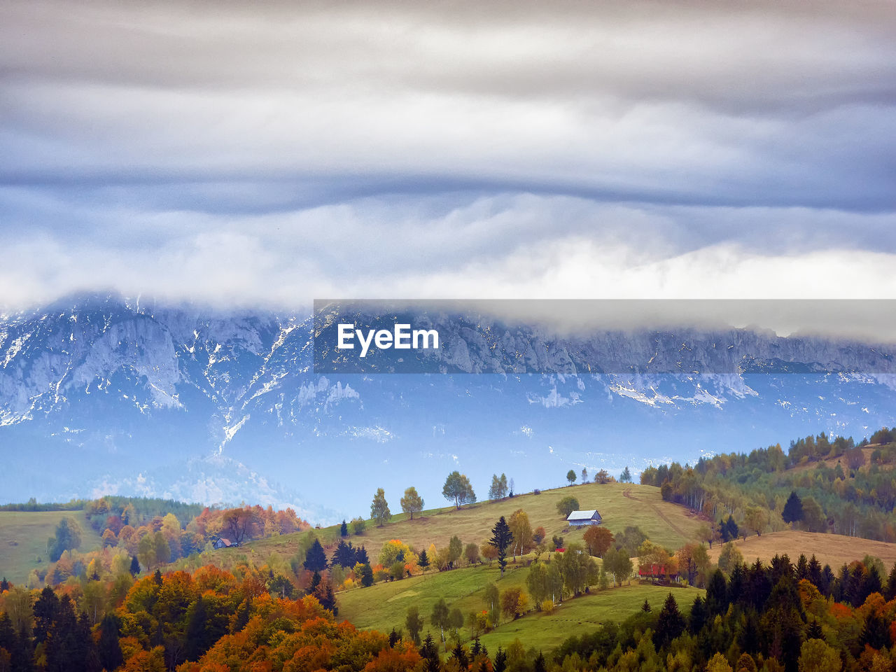 Scenic view of landscape against sky during autumn