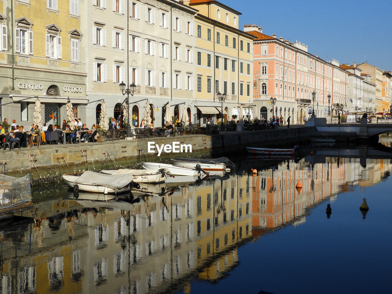 REFLECTION OF BUILDINGS IN WATER