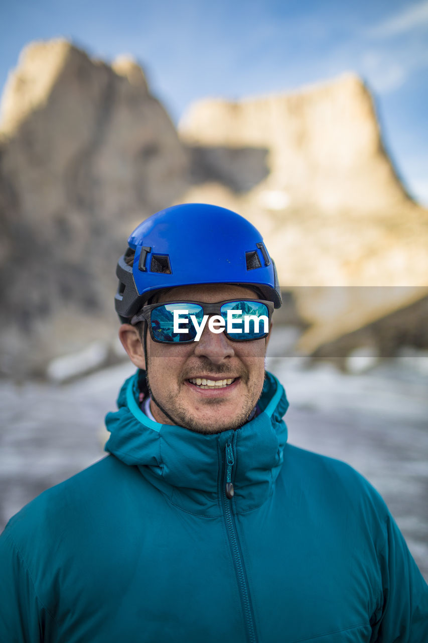 Portrait of climber wearing blue