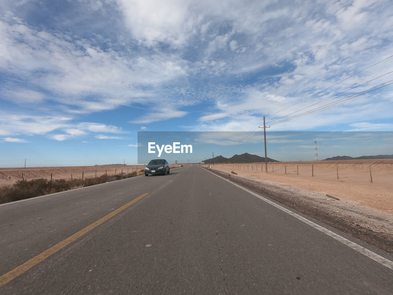 VIEW OF ROAD AGAINST SKY