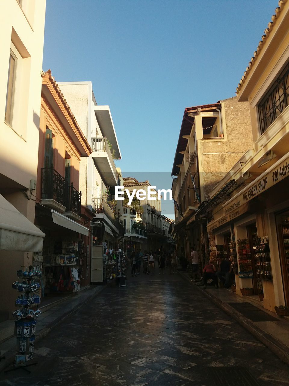 VIEW OF CITY STREET AGAINST SKY