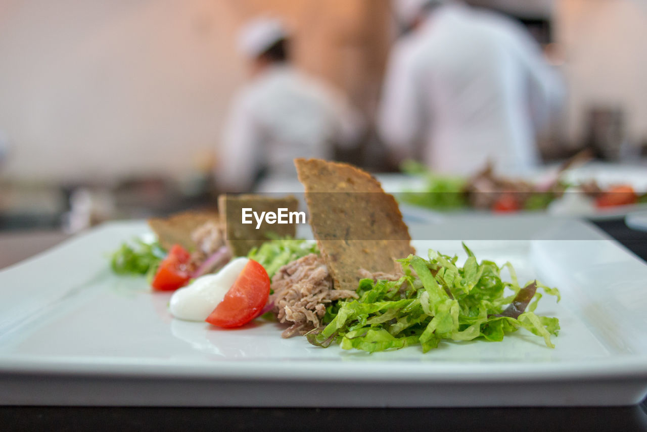 Close-up of salad in plate on table