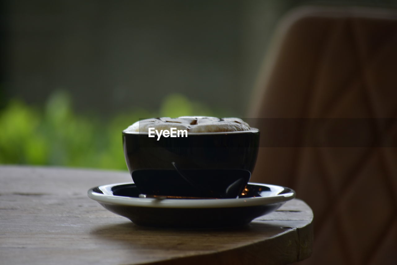 Close-up of coffee on table