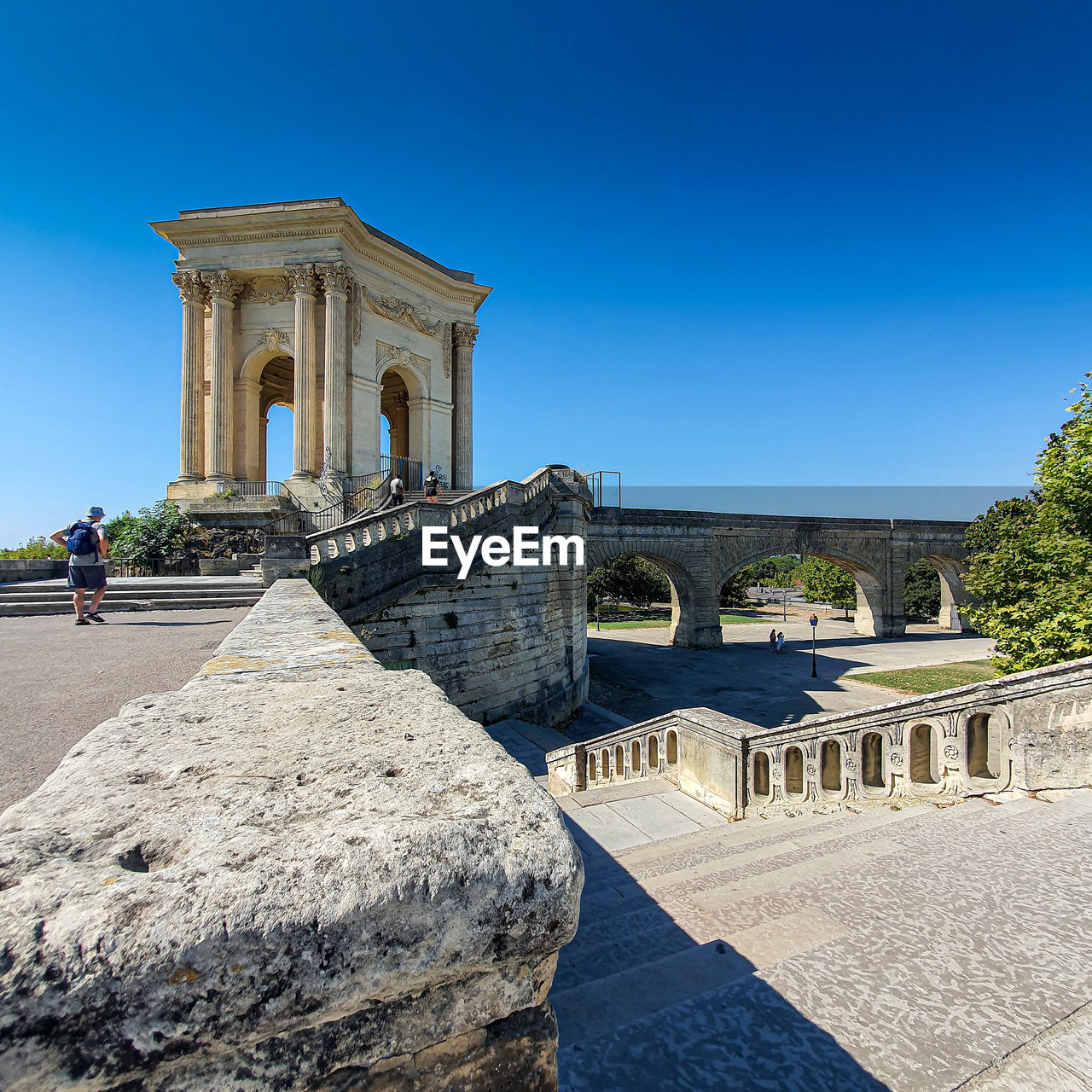 View of historic building against clear blue sky