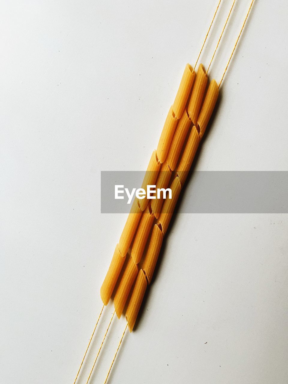 High angle view of pasta on white background