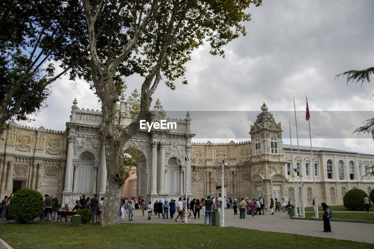 Group of people in front of historical building