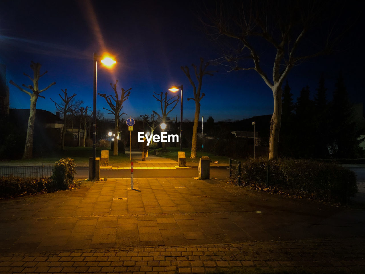 ILLUMINATED STREET AT NIGHT