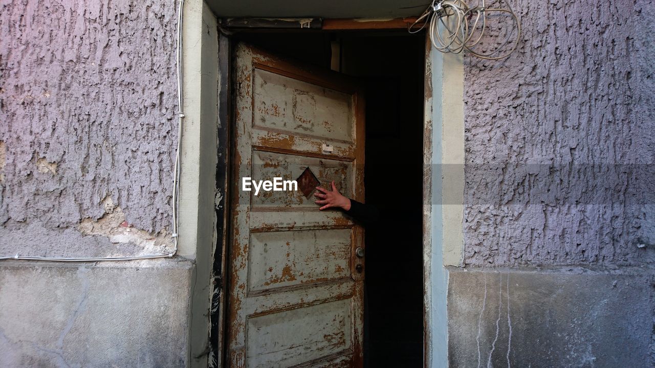 Person touching door