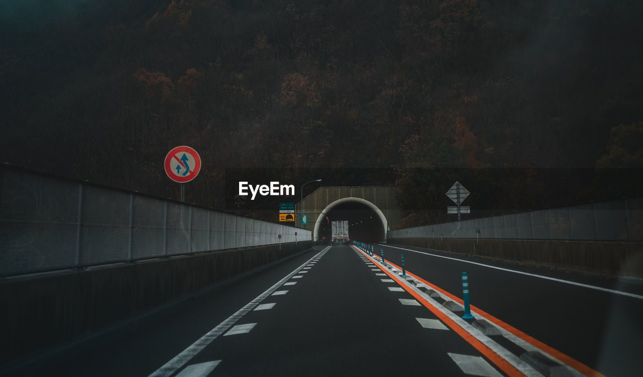 Road entering tunnel