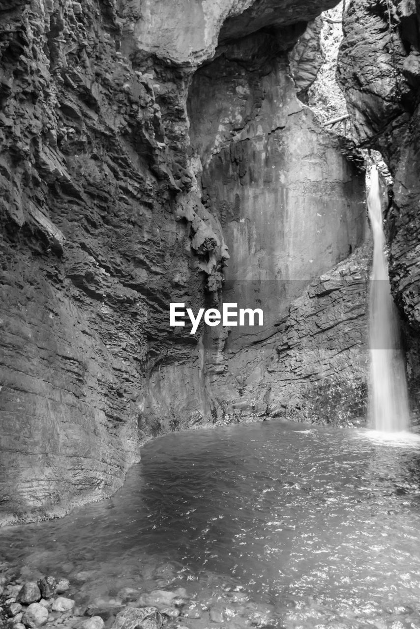 VIEW OF WATERFALL AT CAVE