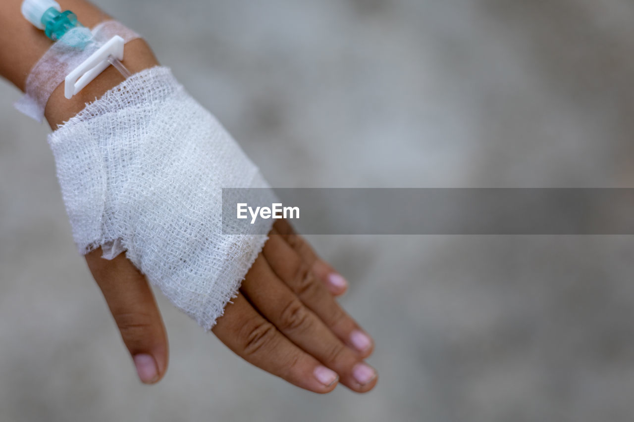 Close-up of hand with bandage