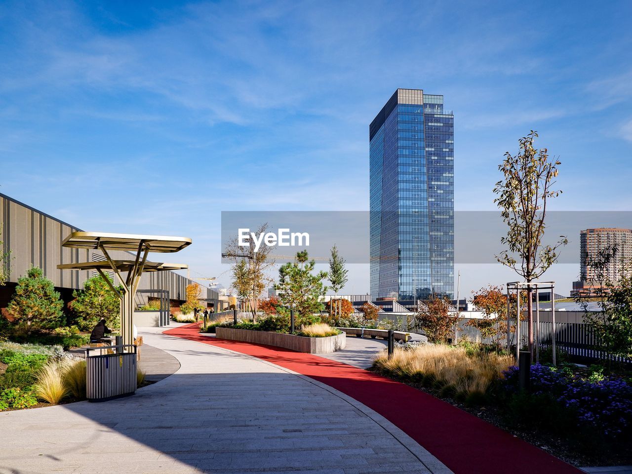 Modern buildings in city against sky