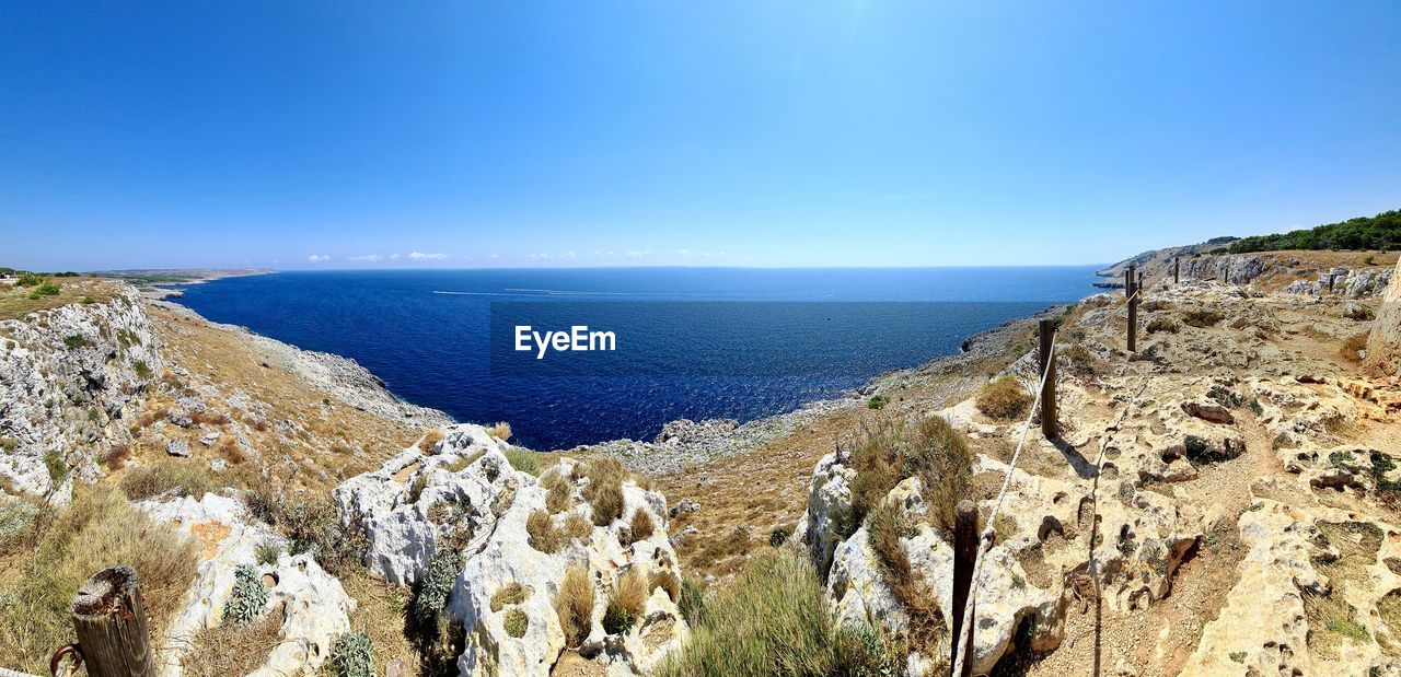 PANORAMIC VIEW OF SEA AGAINST CLEAR SKY