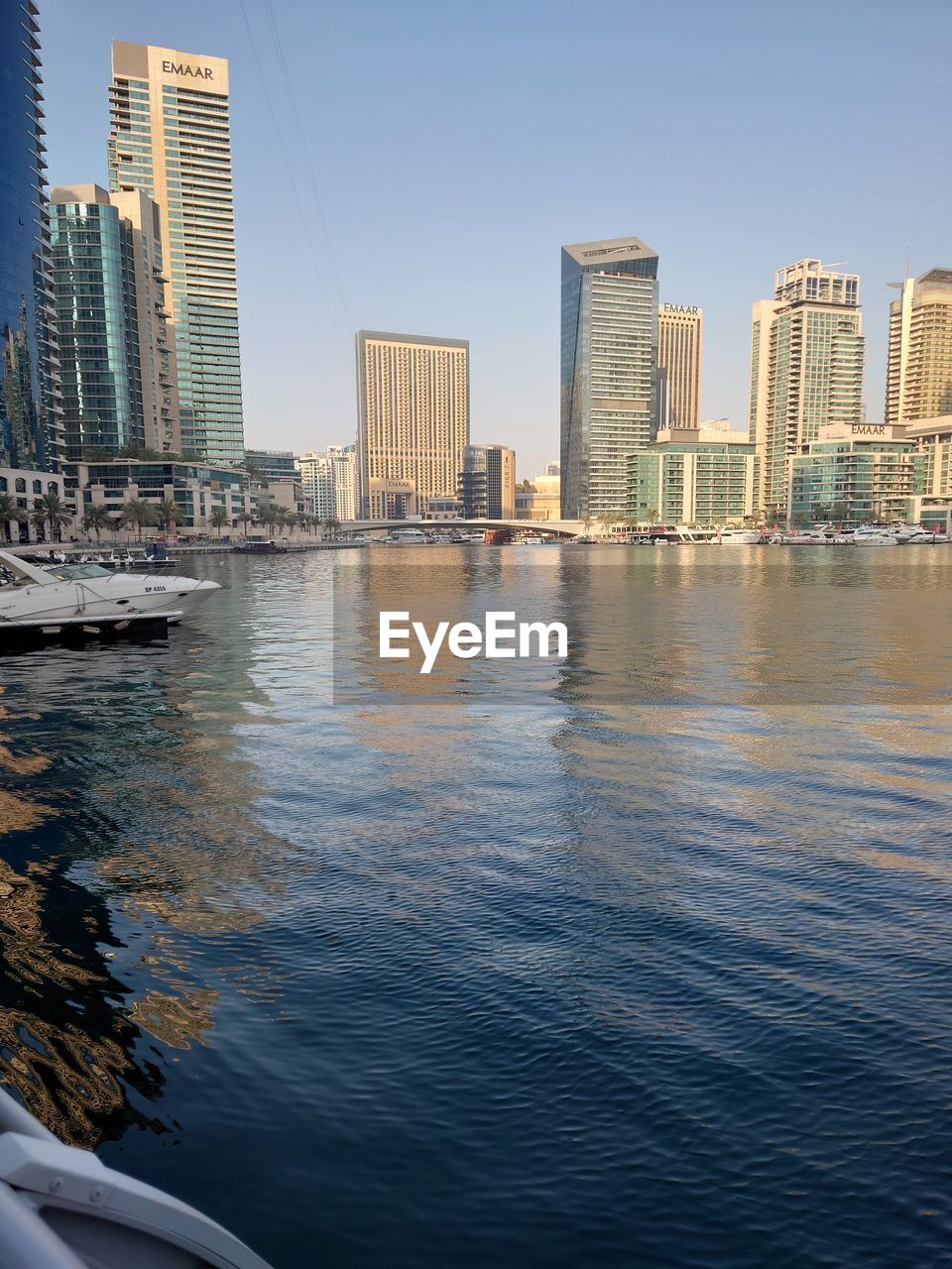 reflection, architecture, built structure, nature, water, sky, building exterior, no people, blue, building, skyscraper, tower, day, outdoors, city, tower block