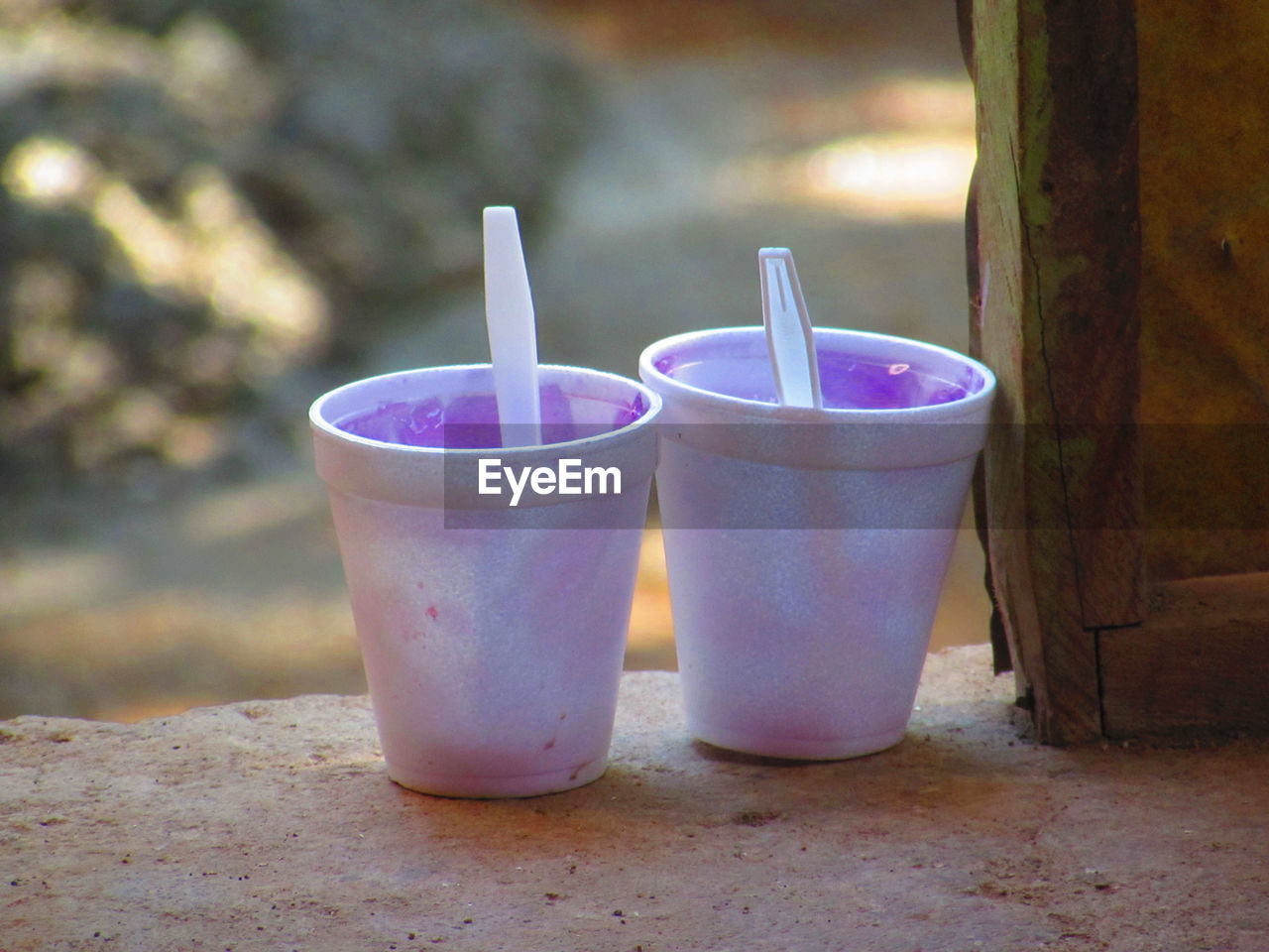 CLOSE-UP OF DRINK ON TABLE