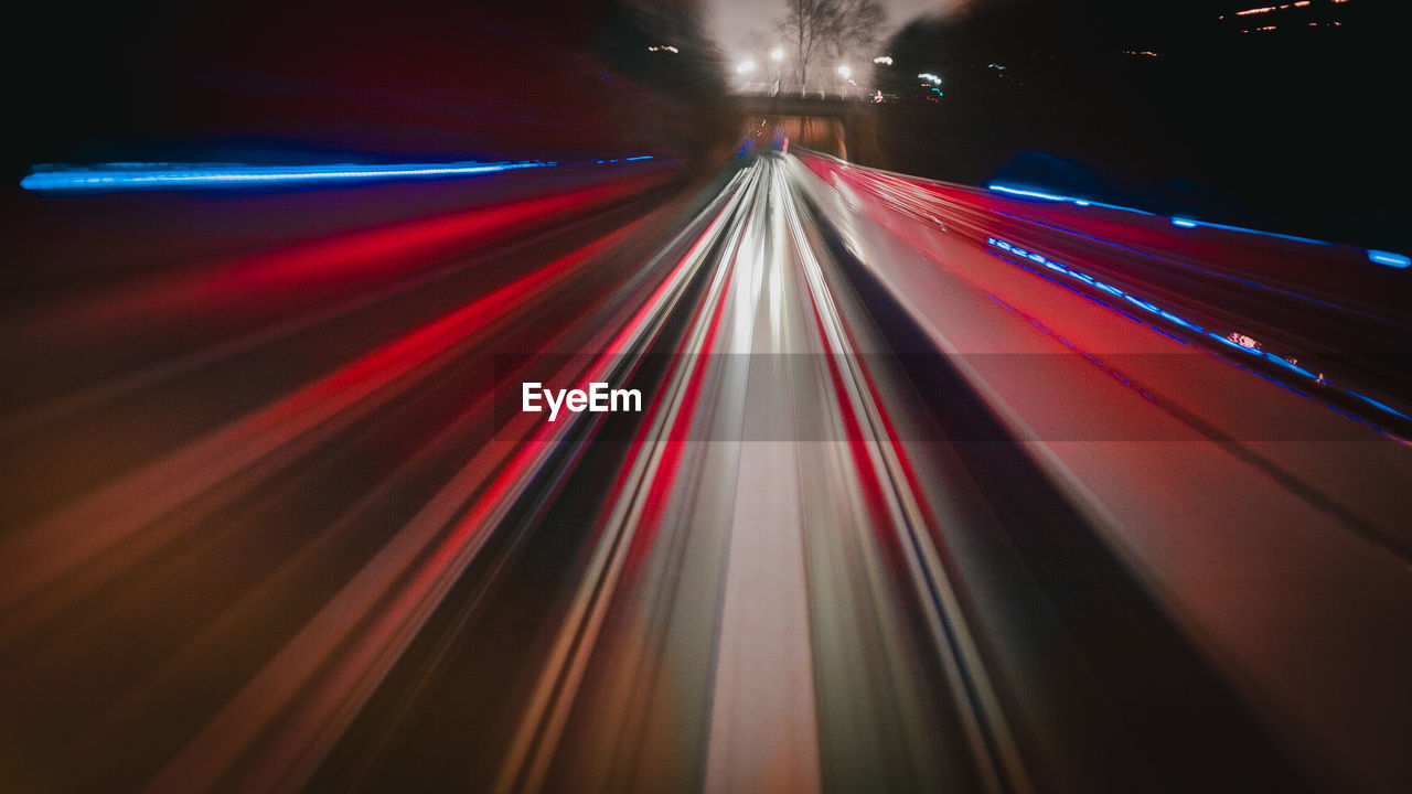 Light trails on road at night