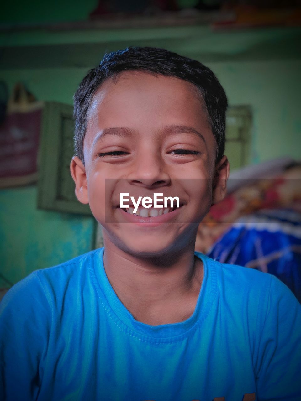 Portrait of smiling boy at home