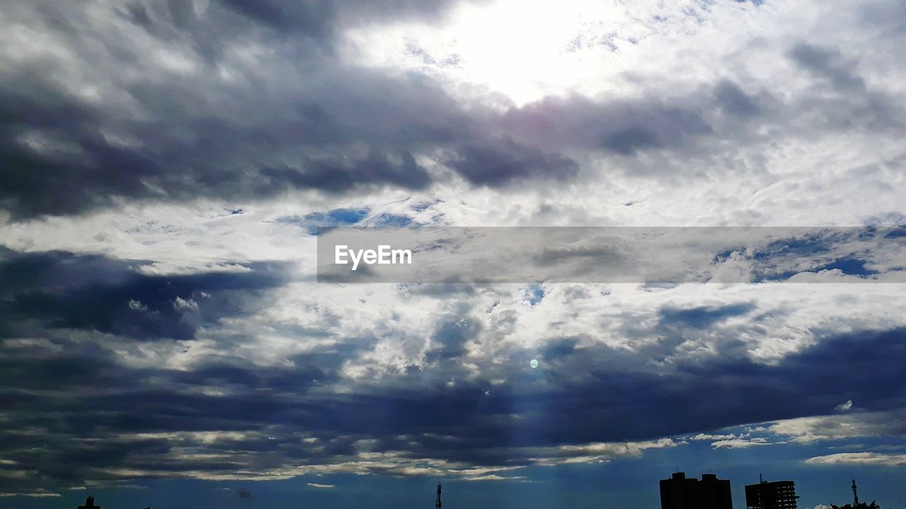 LOW ANGLE VIEW OF SKY IN SUNLIGHT