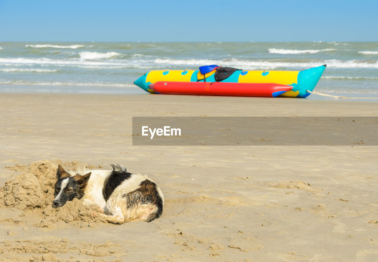 LOUNGE CHAIR ON BEACH