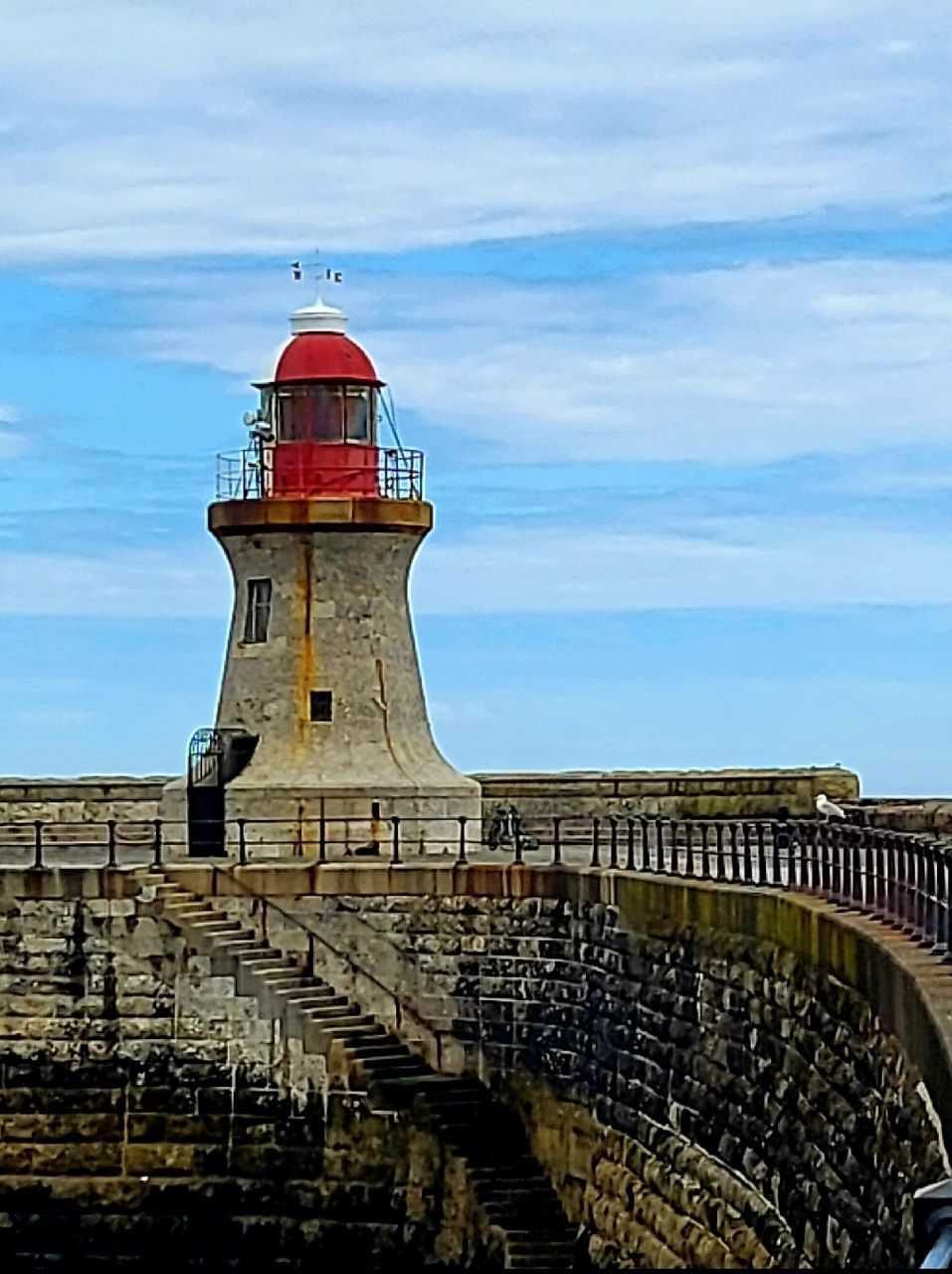 architecture, built structure, lighthouse, tower, building exterior, sky, history, building, security, guidance, protection, the past, landmark, travel destinations, nature, sea, water, travel, no people, cloud, coast, day, outdoors, tourism, city