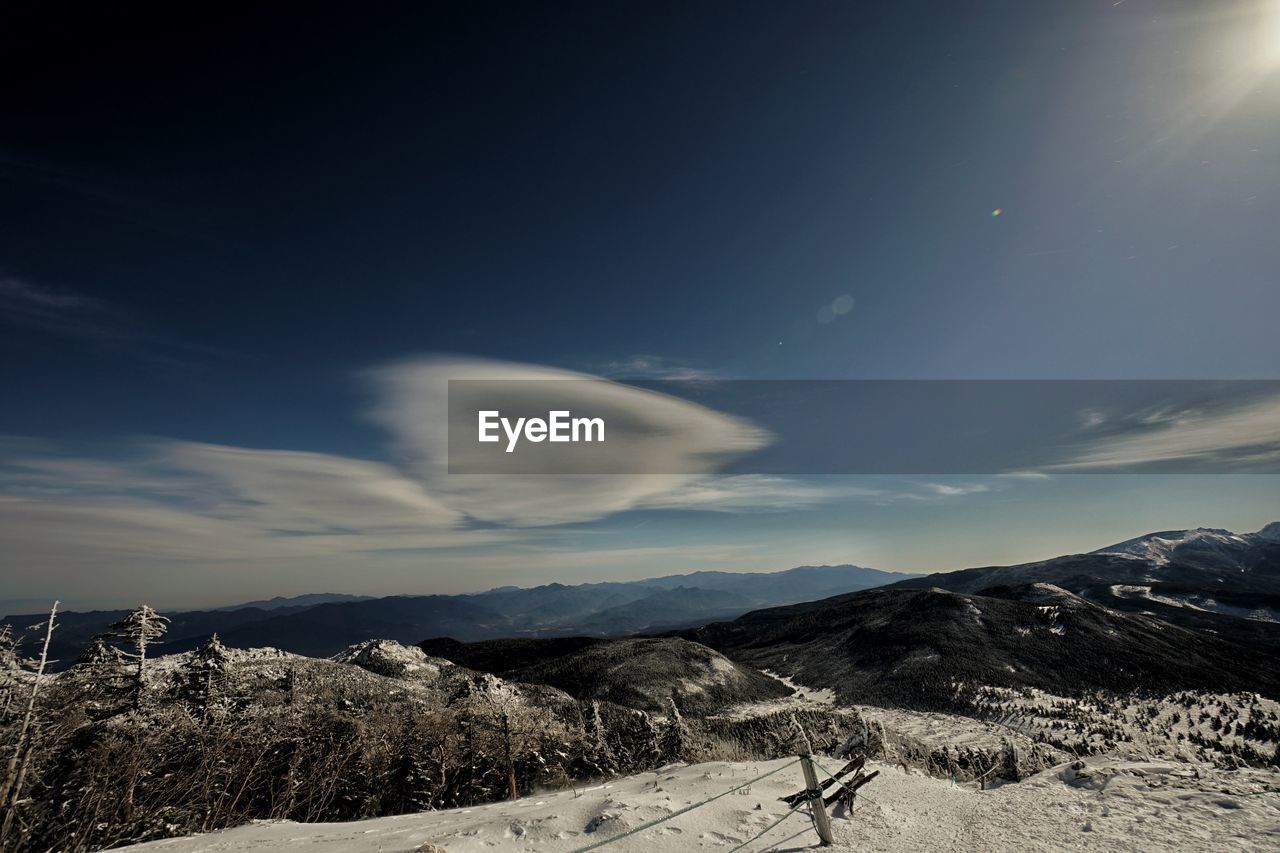 Scenic view of mountain road against sky