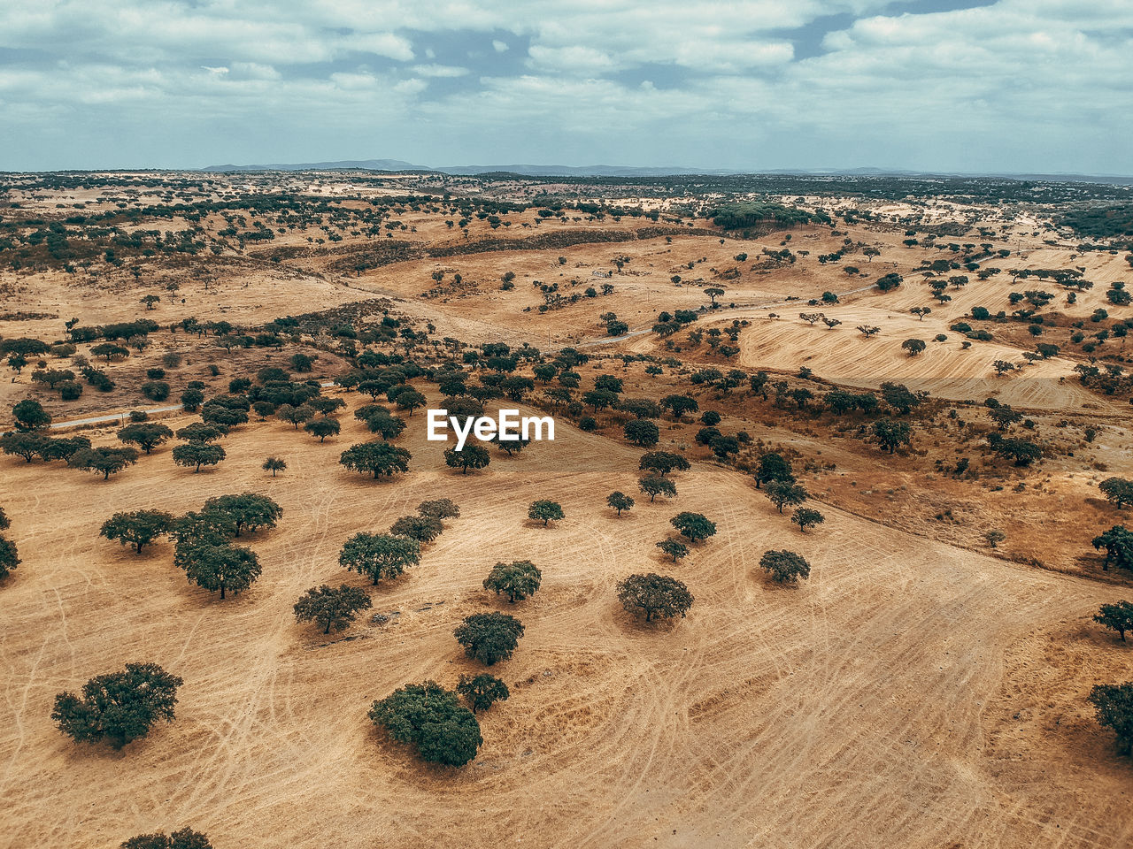 AERIAL VIEW OF LANDSCAPE AND LAND AGAINST SKY