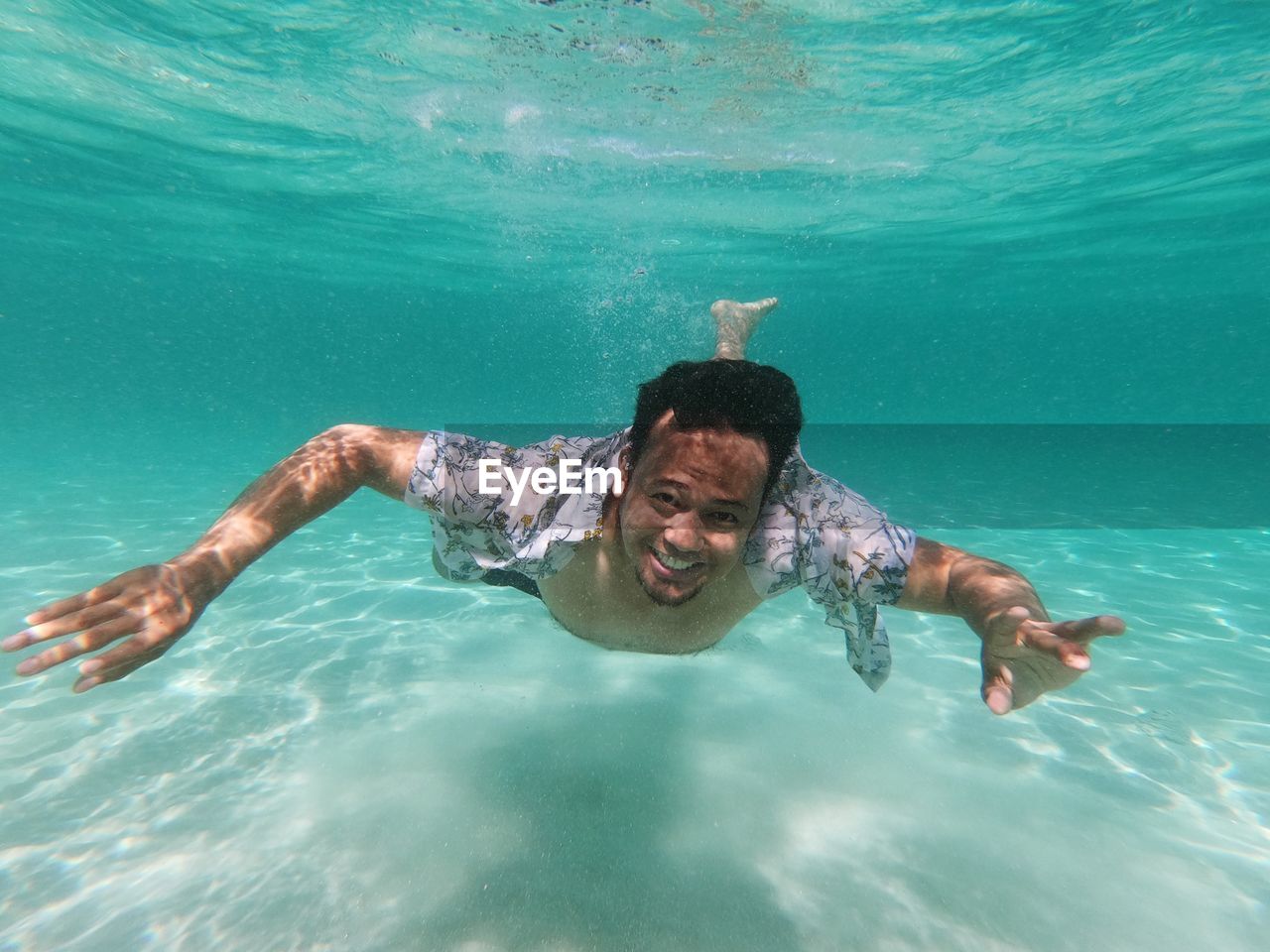 Man swimming in sea