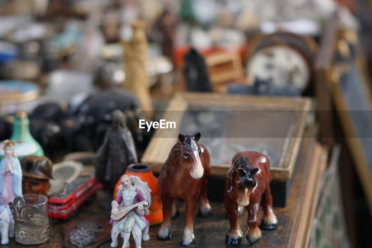 Close-up of figurines on table