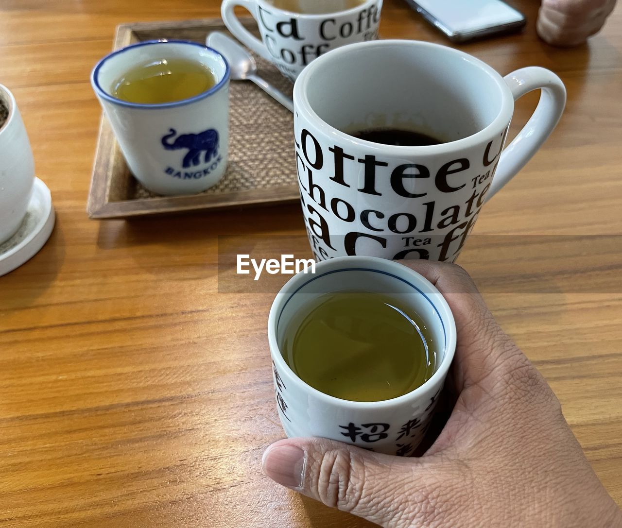 High angle view of coffee cup on table